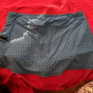 Beach House Skirted Swim Bottoms SZ 16
Blue with black geometric pattern.